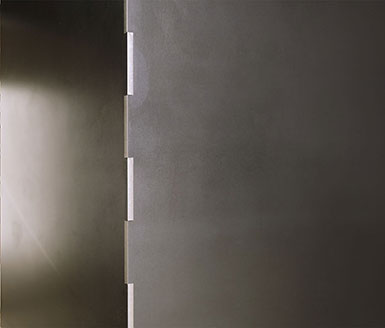 Holzherd Schwarzstahl Eckendetail